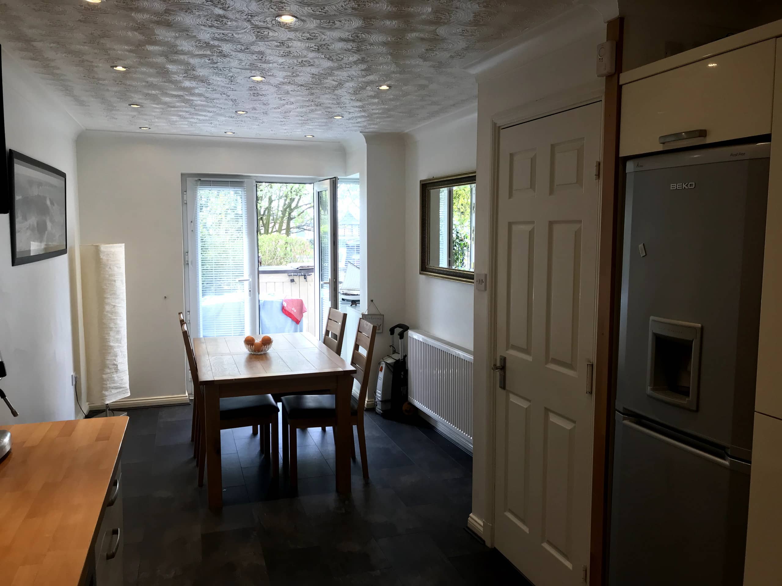 Dining area with doors onto the patio