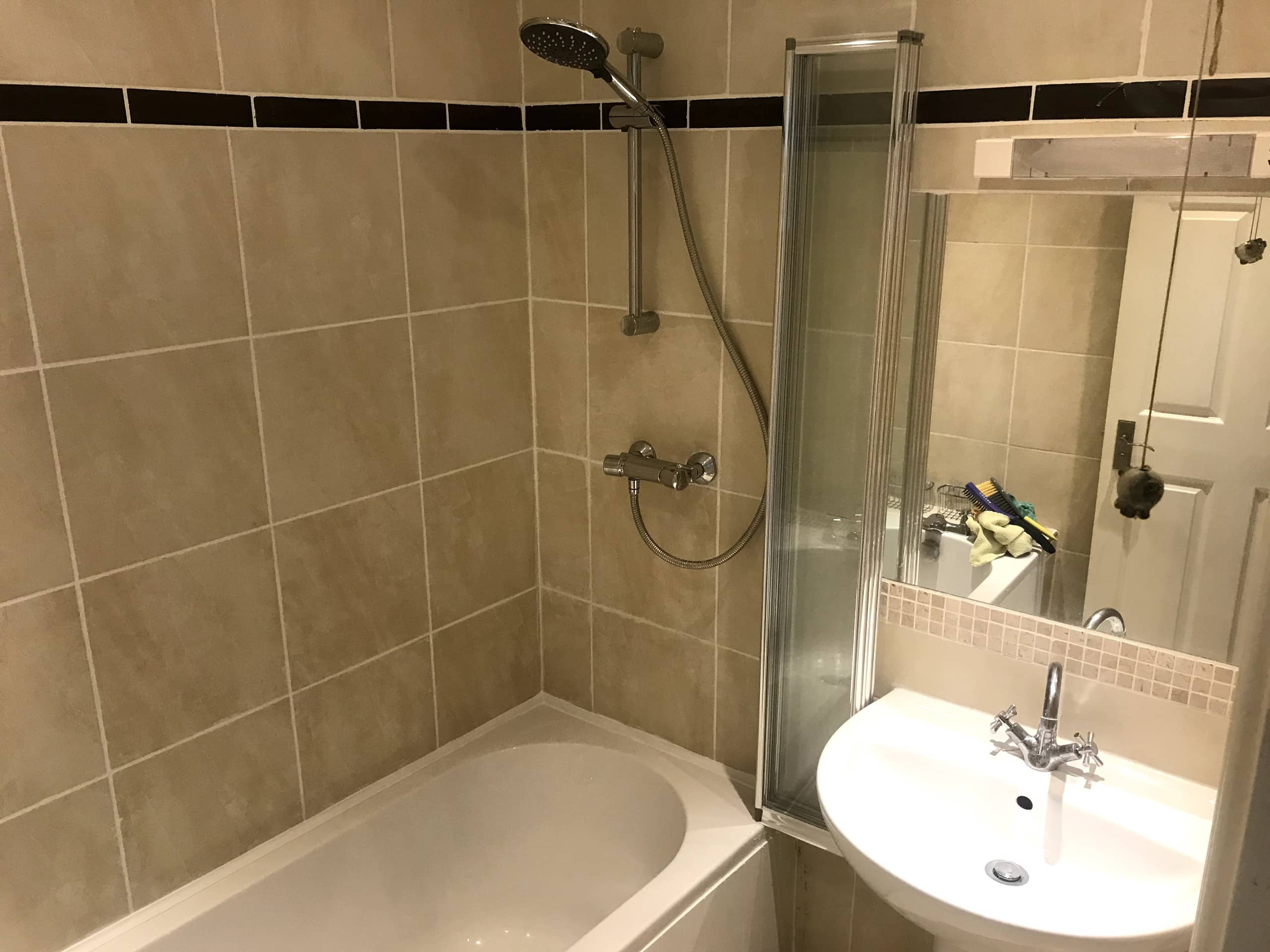 Main bathroom with bath and mains pressure shower